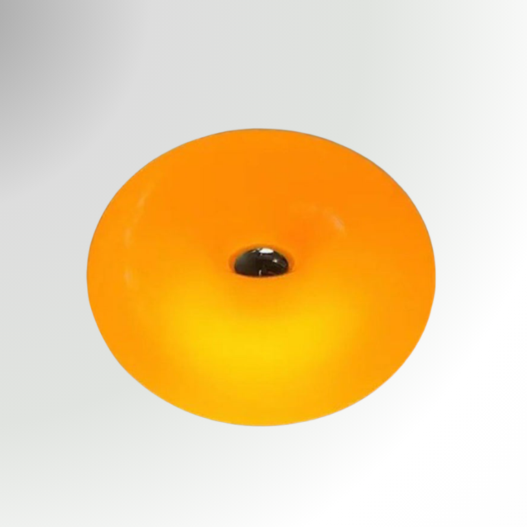 Bauhaus, a circular, donut-shaped, glass lamp. Featured in orange, pictured against a grey background.