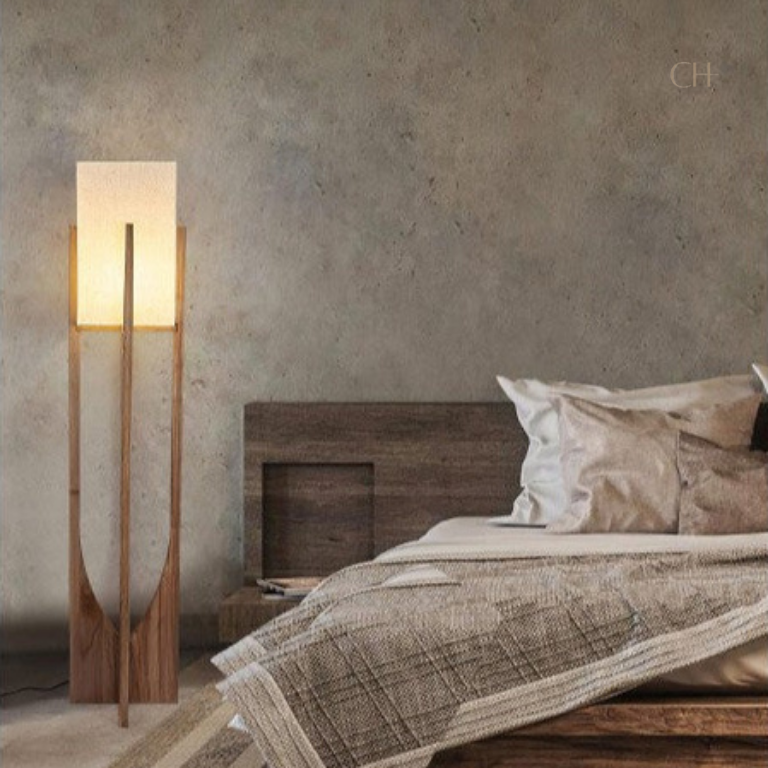 Minari in a bedroom setting with a bed and neutral decor.