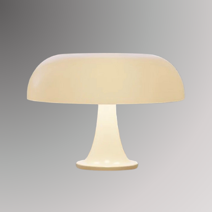 Giancarlo, a modern table lamp with a silhouette resembling a mushroom, featured in an ivory color and pictured against a grey background.