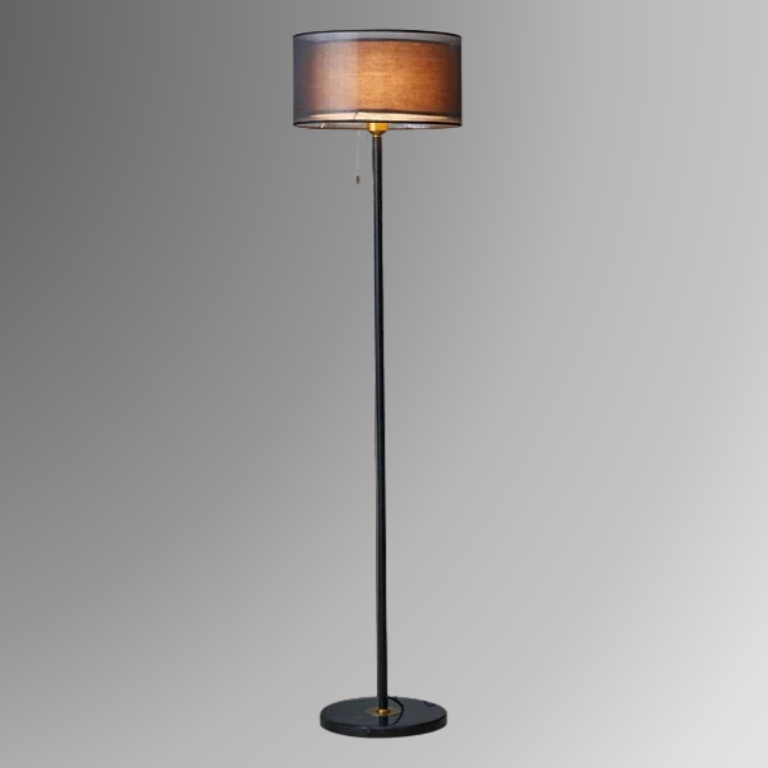 Ansel, a minimal floor lamp with a dual shade design in brown, with a black neck. Ansel is photographed against a gray background