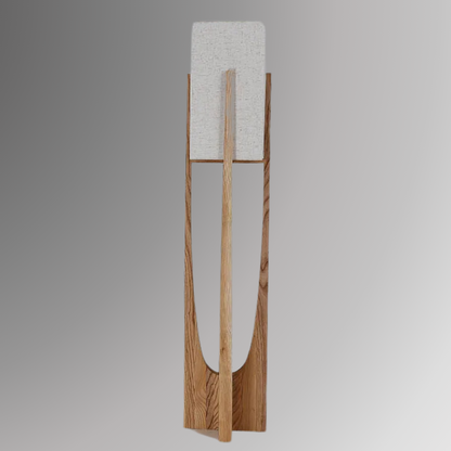 Minari, a floor lamp with a forked wooden base and a cubed linen shade, against a grey background.
