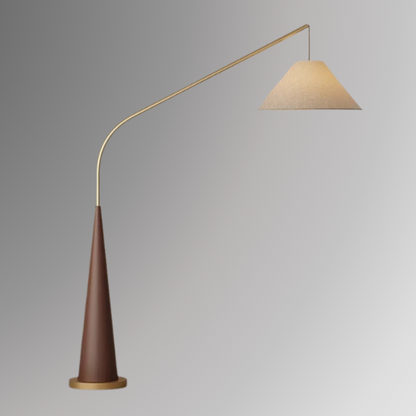 Ellis, a modern floor lamp with a rich brown base and a tapered golden arm on a greyscale background.