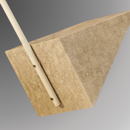 Detailed and zoomed shot of Quentin's triangular stone base. Pictured against a greyscale background.